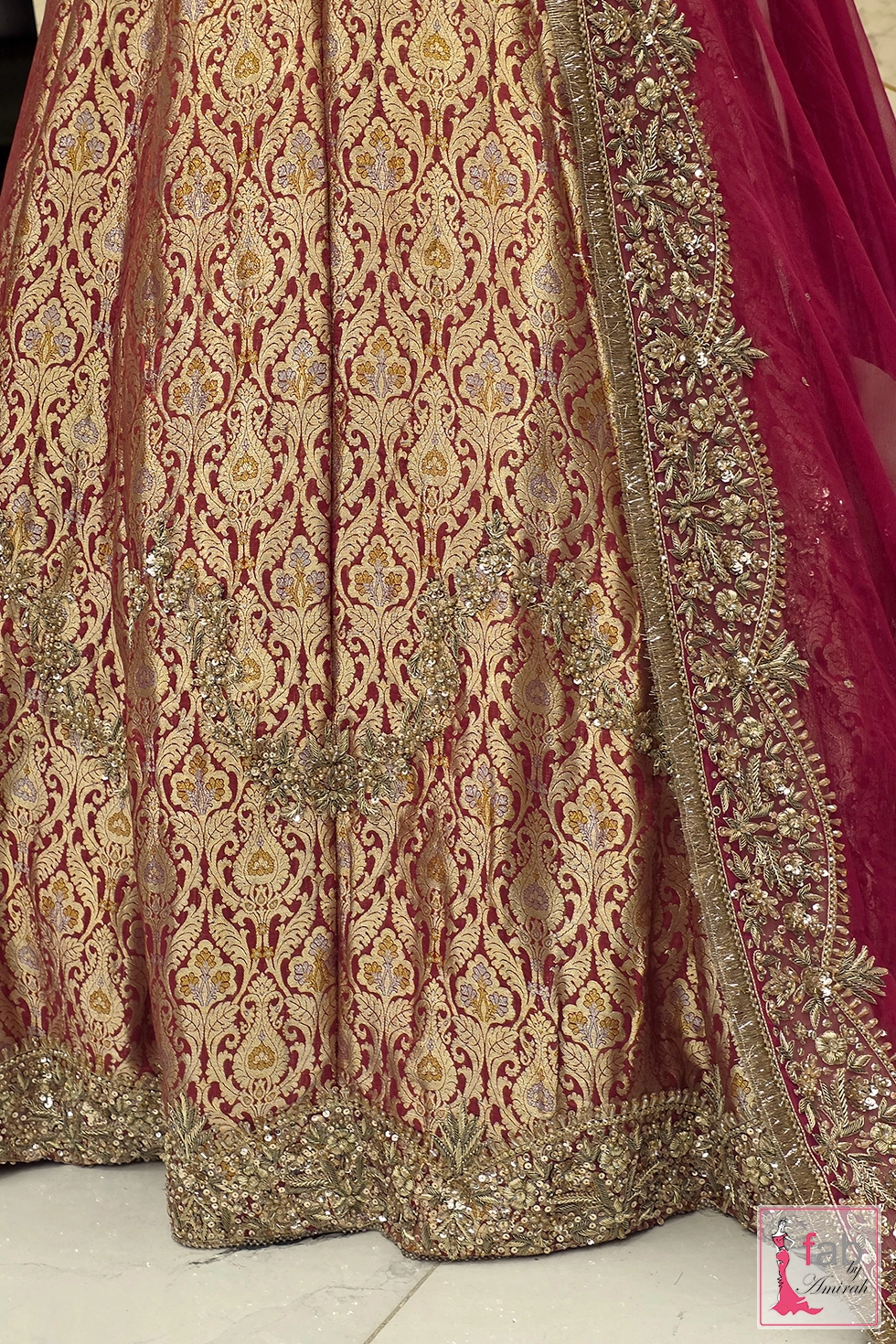 Close up detail of the textured skirt fabric and hemline border