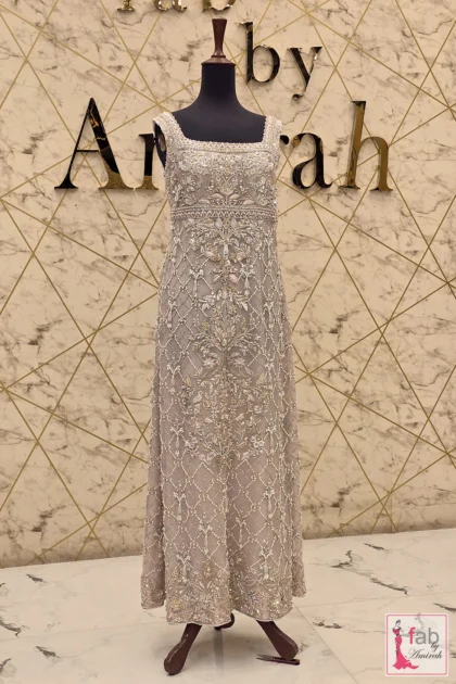 Full length front angle of taupe grey embellished dress