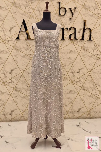 Front view of taupe grey embroidered gown on mannequin