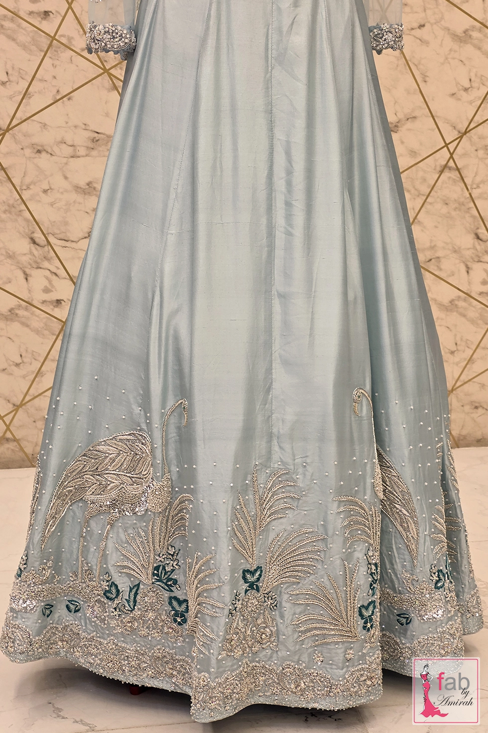 Ice blue bridal lehenga skirt hem with hand embroidered crane bird motifs