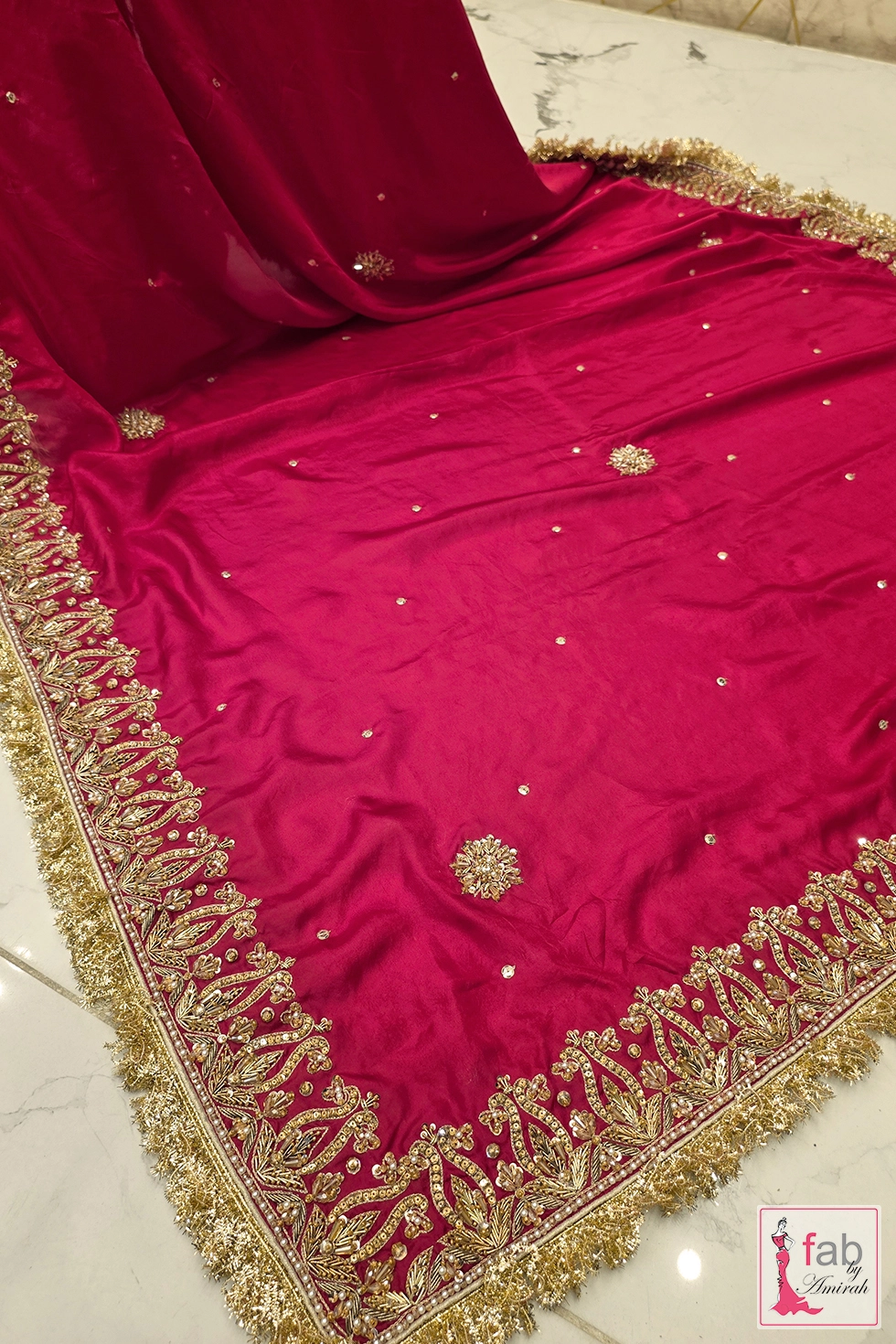 Close up layout of the chiffon dupatta showing border zardozi lace and sequins