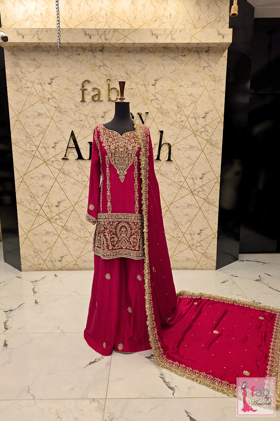 Full length mannequin view showing tunic, flared sharara pants, and long draped dupatta.