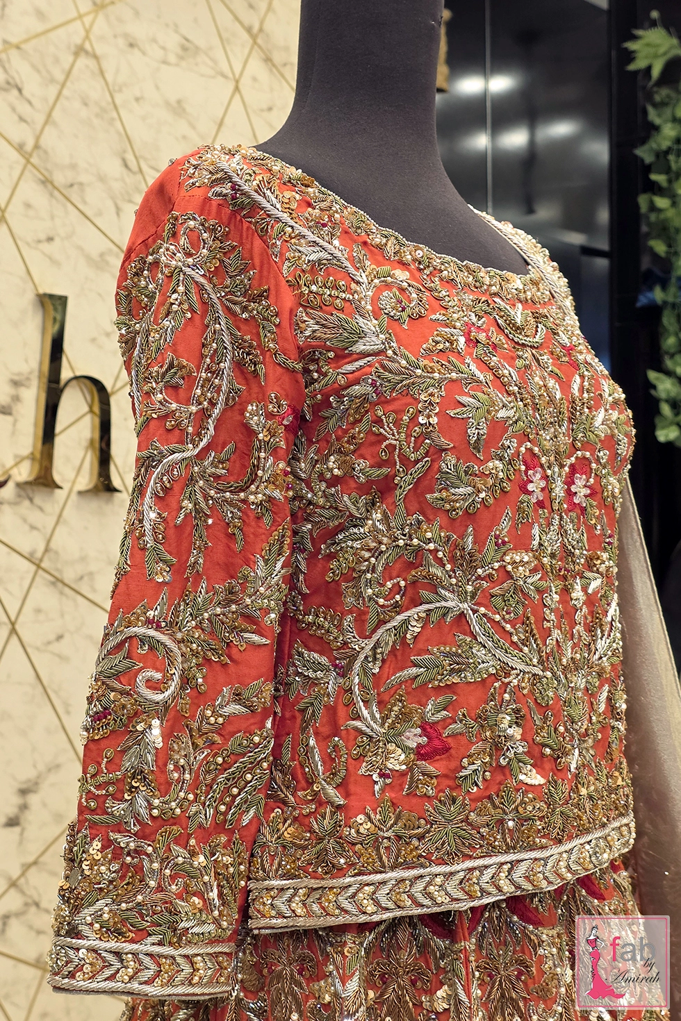 Close up of full length choli sleeves and side seam embellishments