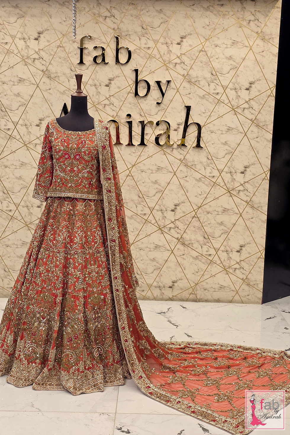 Wide front view showing full circular flare of rust bridal lehenga