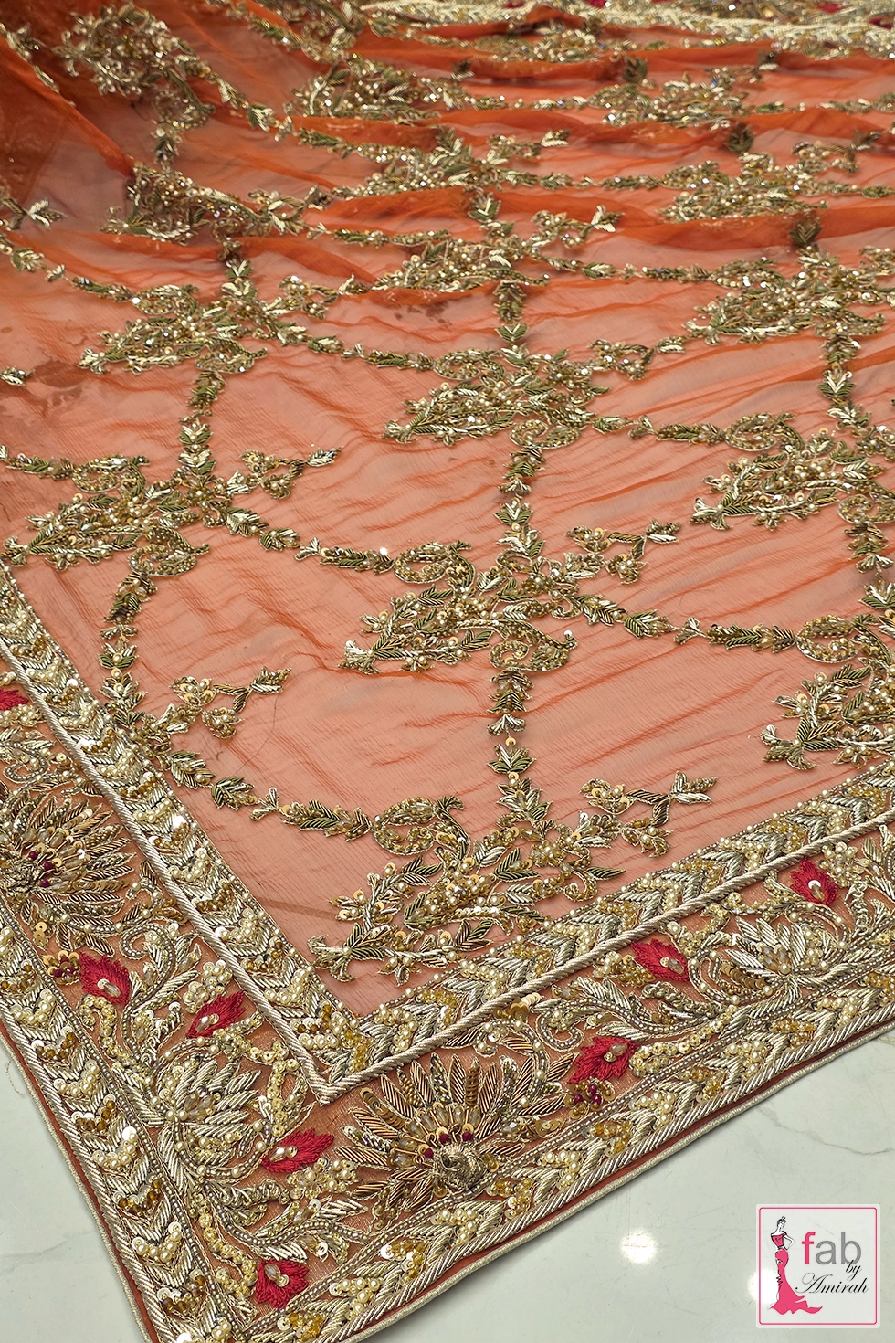 Close up view of sheer net dupatta jaal pattern and scalloped border