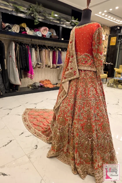 Side profile showing longline choli and flared lehenga skirt drape