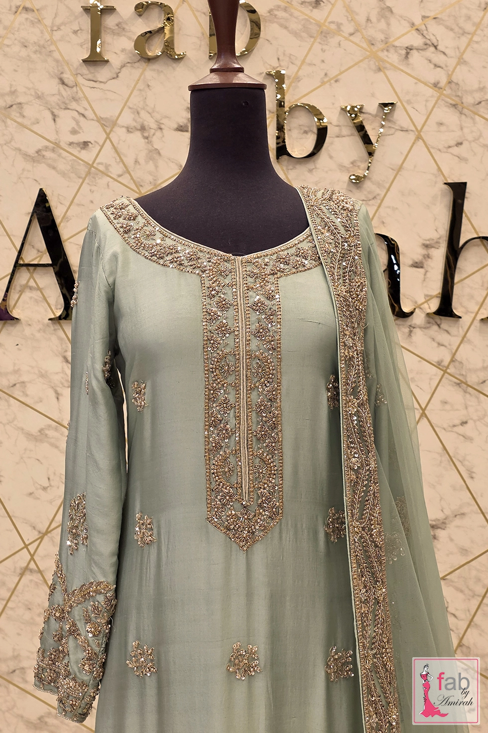 Neckline hand embroidery details on pistachio green kameez set