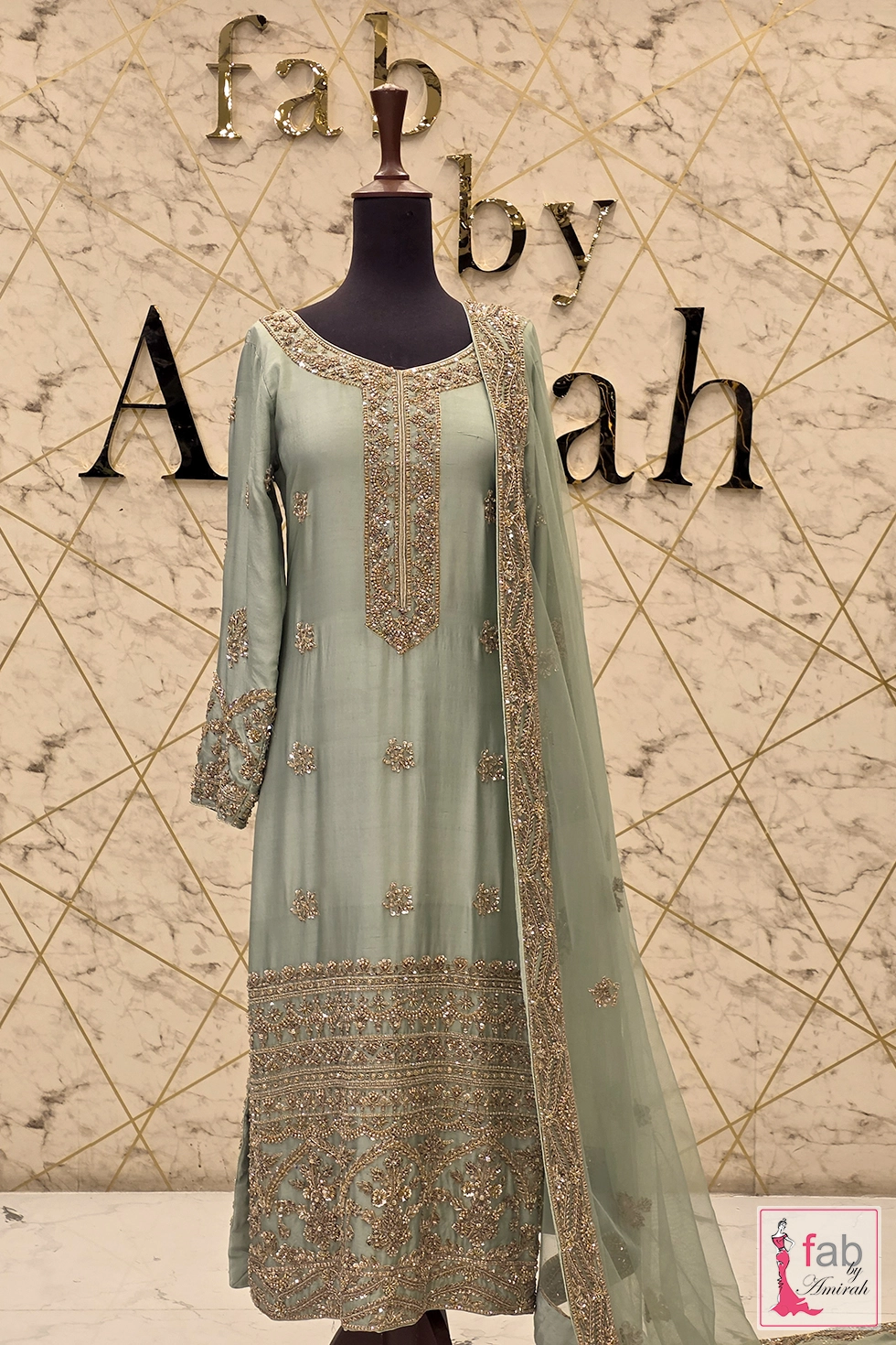 Front full length view of pistachio green formal wear suit set