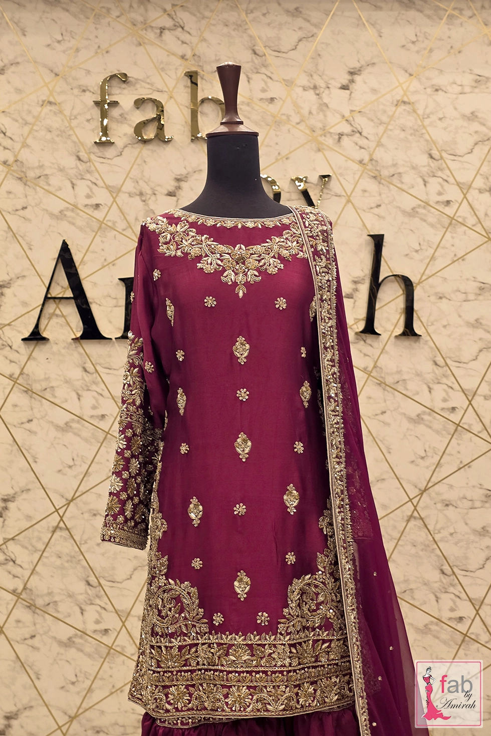 Full length front view of deep magenta hand embroidered suit